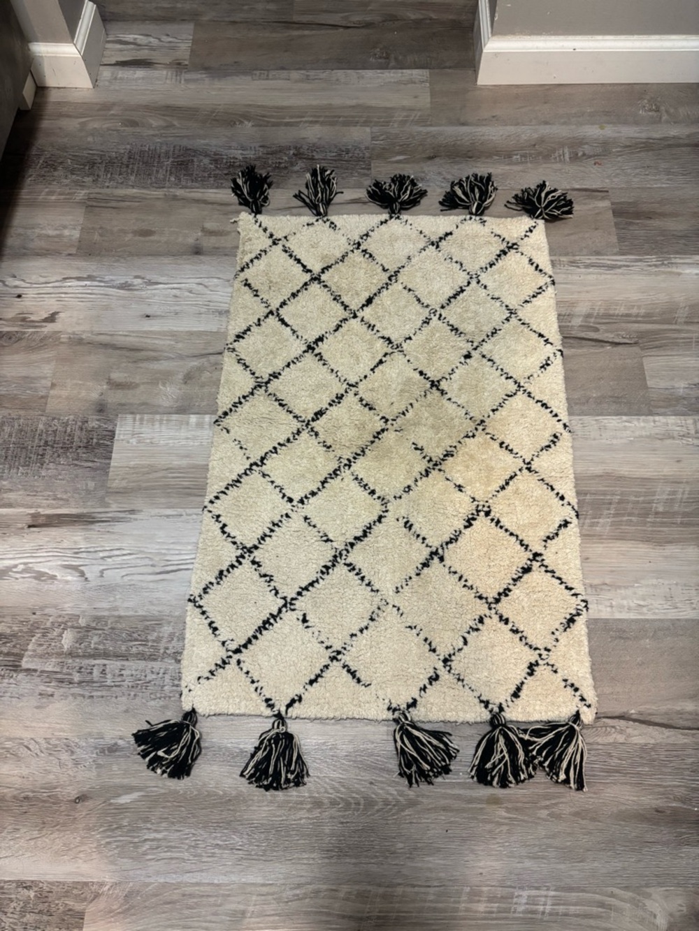 Cream and Black Diamond Tassel Rug